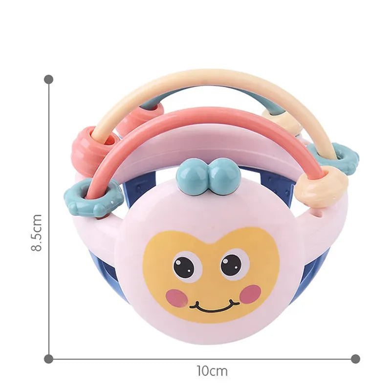 Baby Play Ball with Soft Textured Elements, Movable Rings and Bright Colors in Yellow or Pink