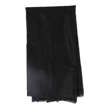 Spider Web Mesh Table Topper in Black for Halloween Snack Tables and Party Spreads