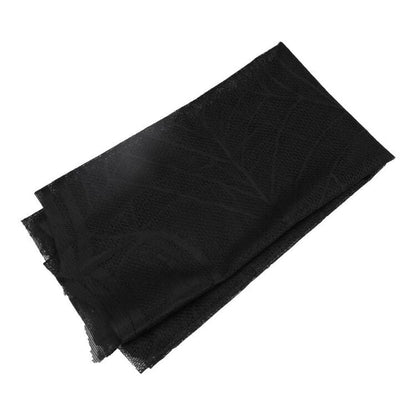 Spider Web Mesh Table Topper in Black for Halloween Snack Tables and Party Spreads