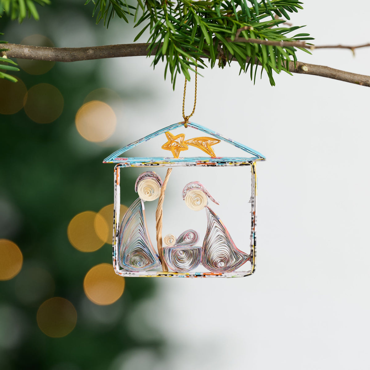 Layered Quilled Paper Ornament of the Holy Family in a Stable Beneath a Shooting Star