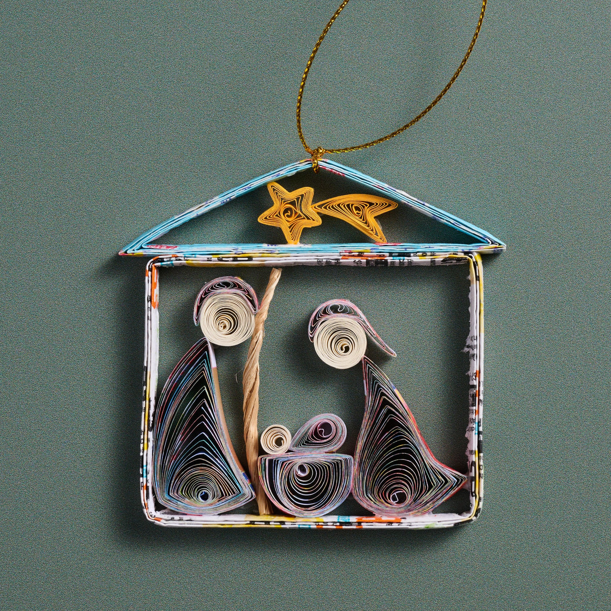Layered Quilled Paper Ornament of the Holy Family in a Stable Beneath a Shooting Star