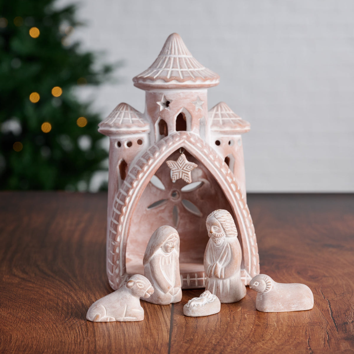 Six Piece Terracotta Nativity with a Carved Three Spire Palace, Cow, Sheep and Hanging Star