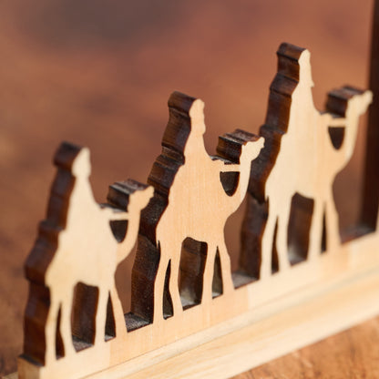 Hand Cut Pine Nativity Scene with a Praying Holy Family and Three Wise Men on Camels