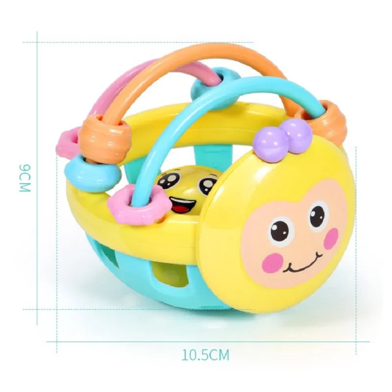 Baby Play Ball with Soft Textured Elements, Movable Rings and Bright Colors in Yellow or Pink