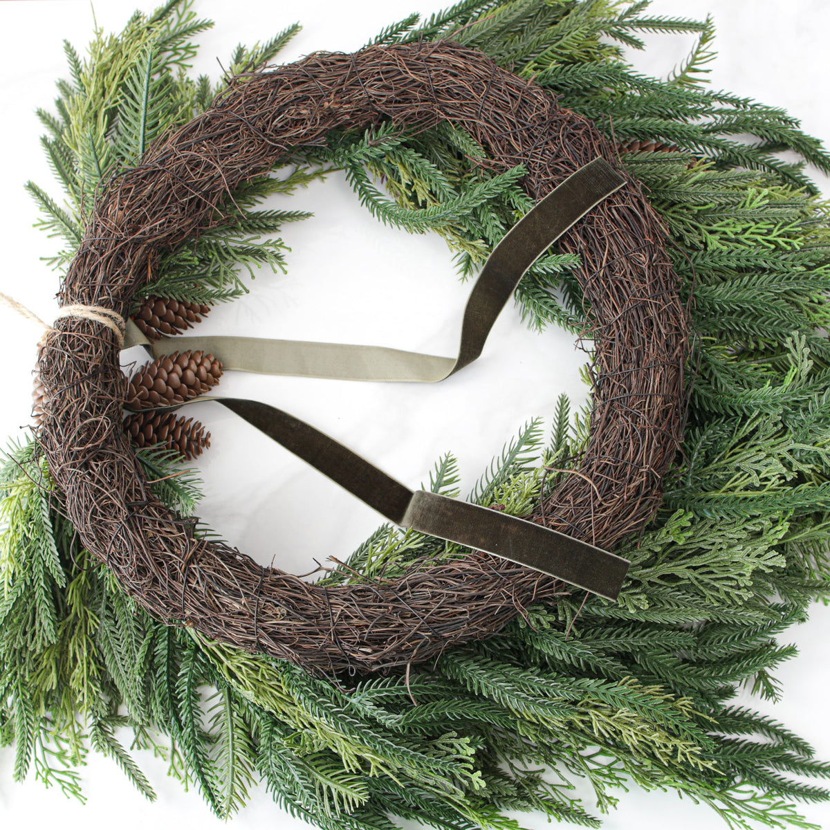 Heart Shaped Pine Wreath with Pine Cones and Hunter Green Ribbon 24 Inch