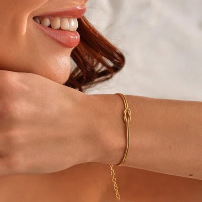 Love Knot Bracelet with an Adjustable Closure and a Lightweight Minimalist Design in Silver, Gold or Rose Gold