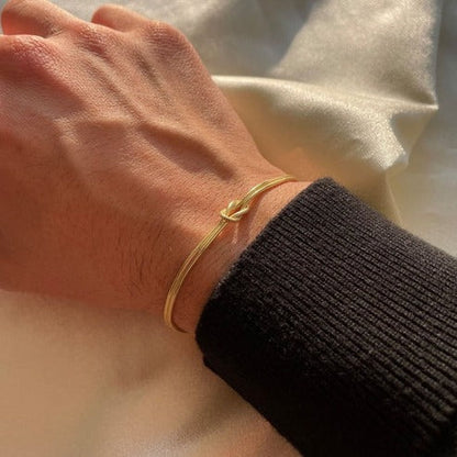 Love Knot Bracelet with an Adjustable Closure and a Lightweight Minimalist Design in Silver, Gold or Rose Gold