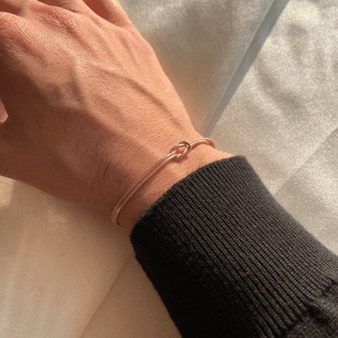 Love Knot Bracelet with an Adjustable Closure and a Lightweight Minimalist Design in Silver, Gold or Rose Gold