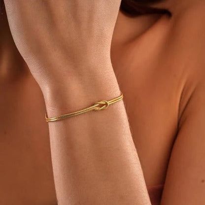 Love Knot Bracelet with an Adjustable Closure and a Lightweight Minimalist Design in Silver, Gold or Rose Gold