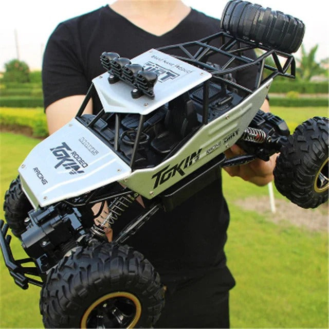 Rechargeable 4WD Remote Control Monster Truck with Big Tires and Two Battery Packs for Kids