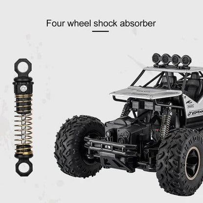 Rechargeable 4WD Remote Control Monster Truck with Big Tires and Two Battery Packs for Kids