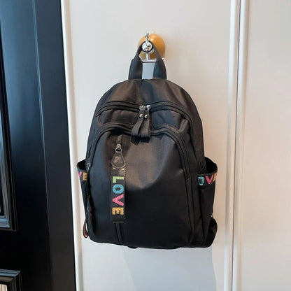 Dual Compartment Laptop Backpack with Weather Resistant Fabric