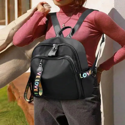 Dual Compartment Laptop Backpack with Weather Resistant Fabric