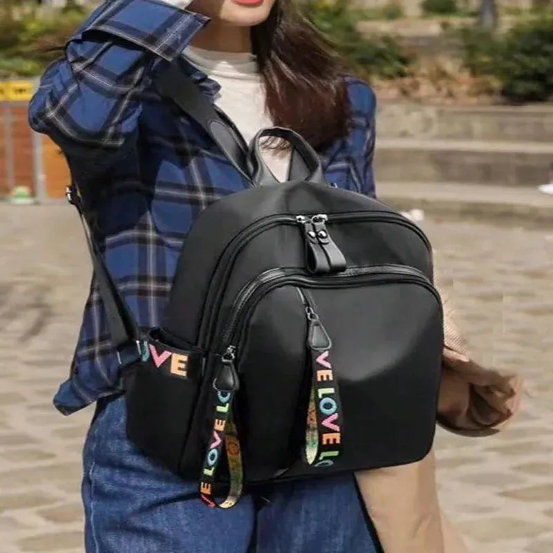 Dual Compartment Laptop Backpack with Weather Resistant Fabric