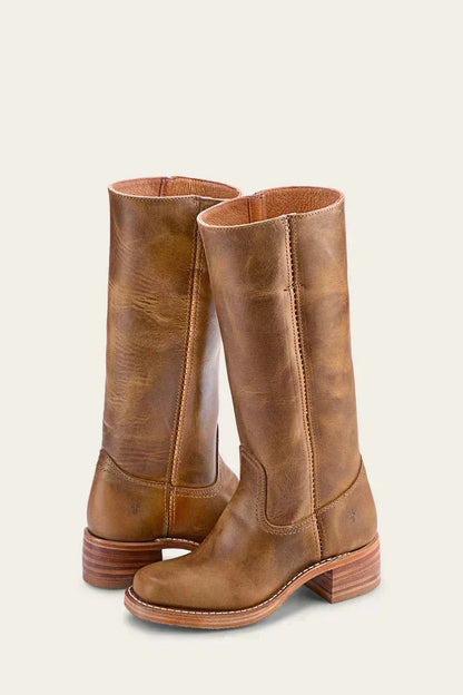 Elegant women's mid-calf block heel boots with a closed toe, ideal for winter outfits.